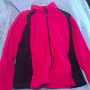 A pink coat/jacket